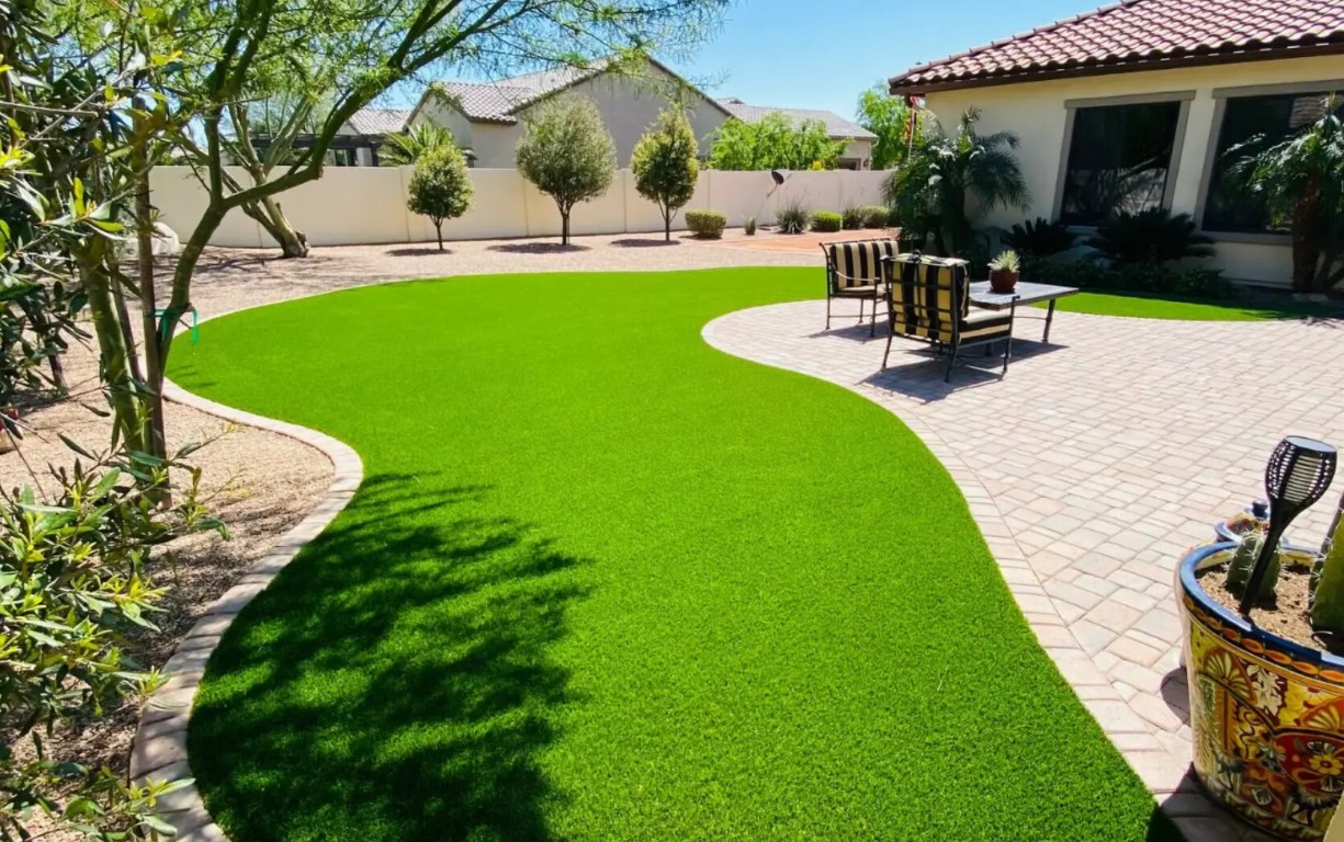 Professional artificial grass installation in West Allis backyard