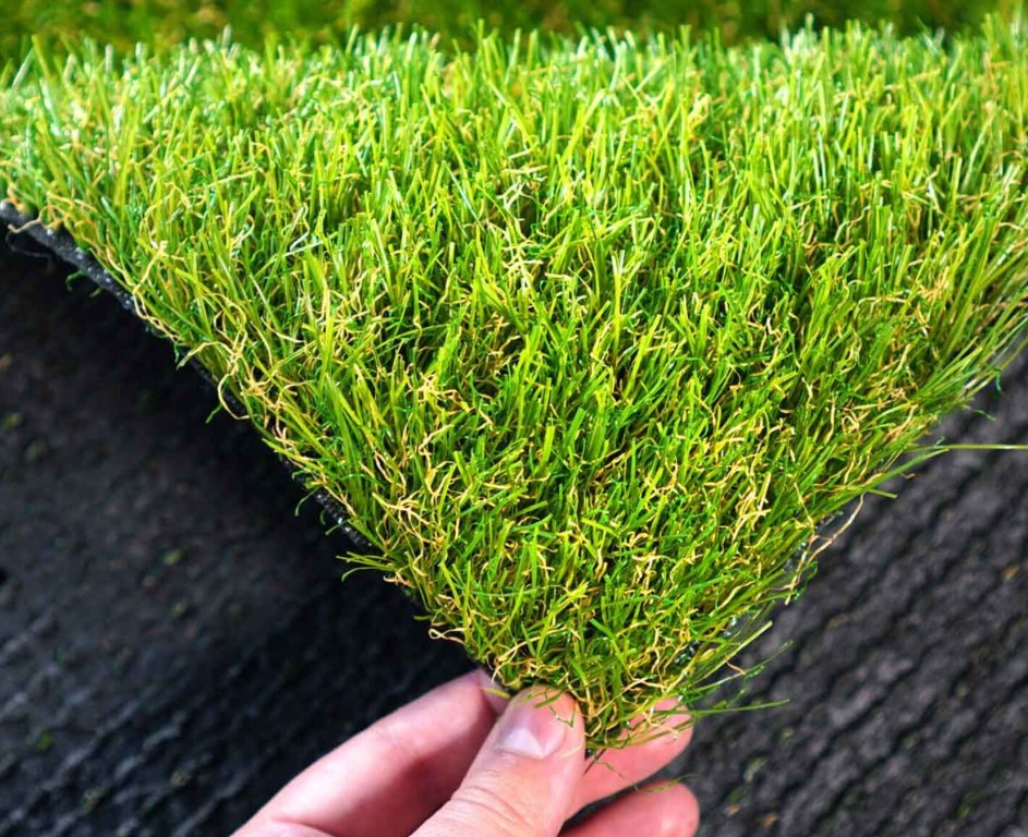 Close-up of pet-safe artificial grass showing drainage system